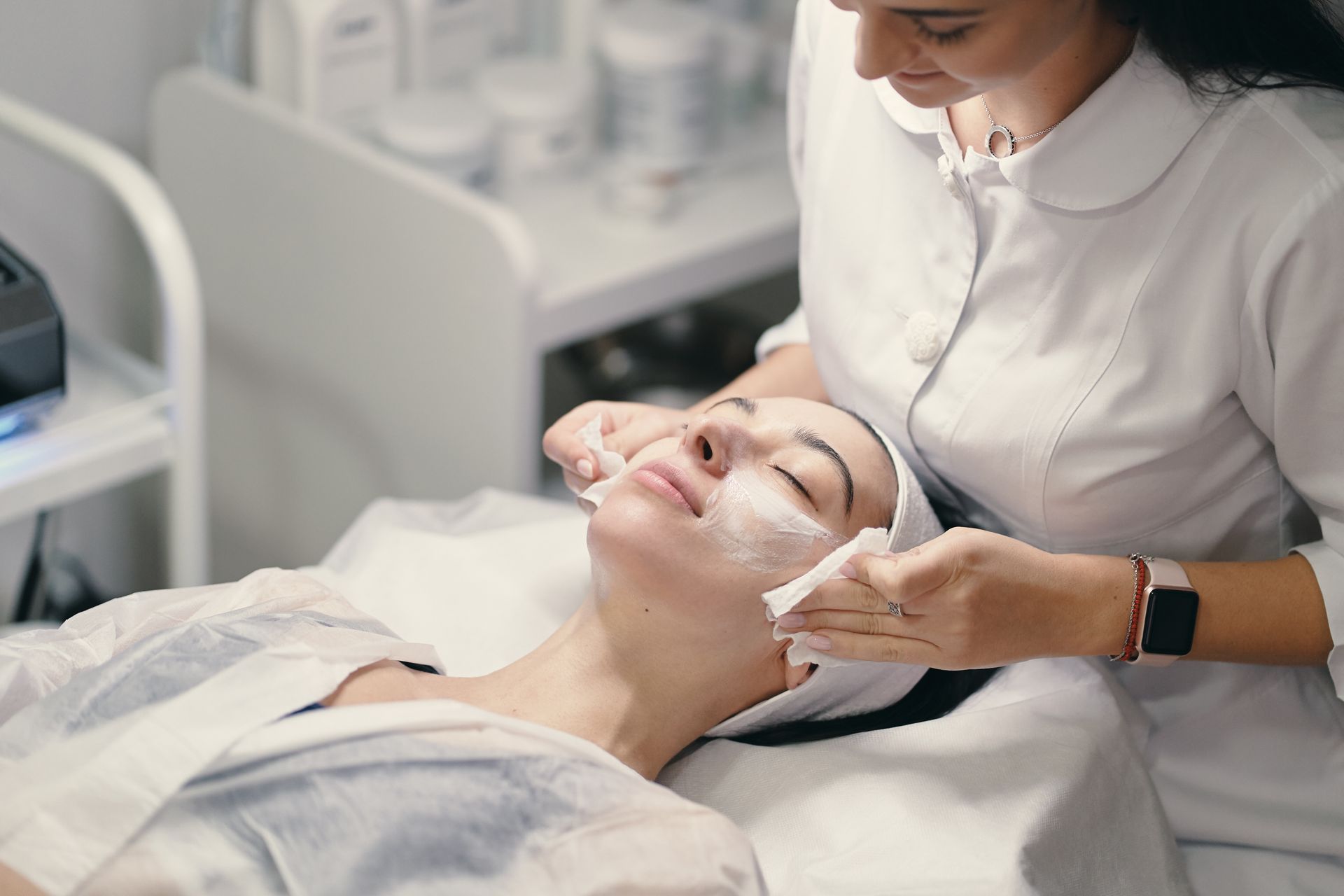 a woman getting a cemical peel treatment