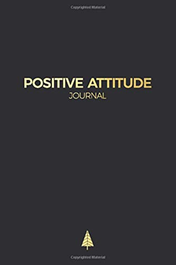 The cover of a positive attitude journal with a tree on it.