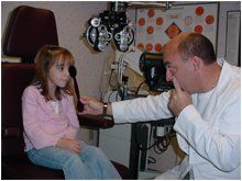 Eye Doctor & Patient Inside His Office — Defiance, OH — Professional Vision Services, LLC