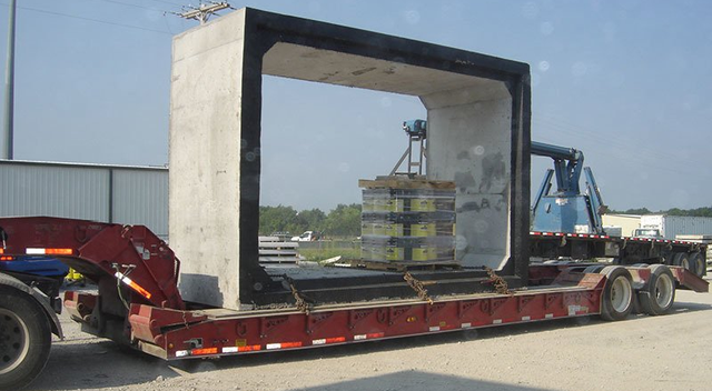 large concrete box culvert being hauled
