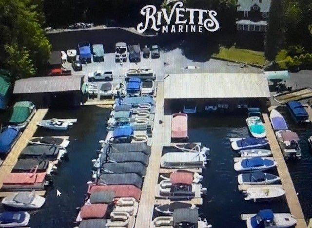An aerial view of rivetts marine with many boats docked