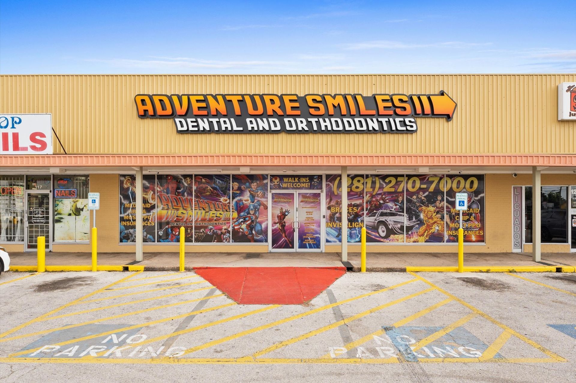 Adventure Smiles Dental & Orthodontics in Houston - A dental and orthodontic office with a parking lot in front of it.