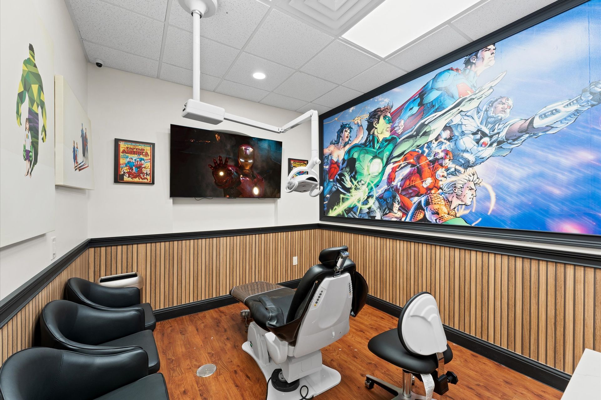 Adventure Smiles Dental & Orthodontics in Houston - A dental office with a superhero mural on the wall.