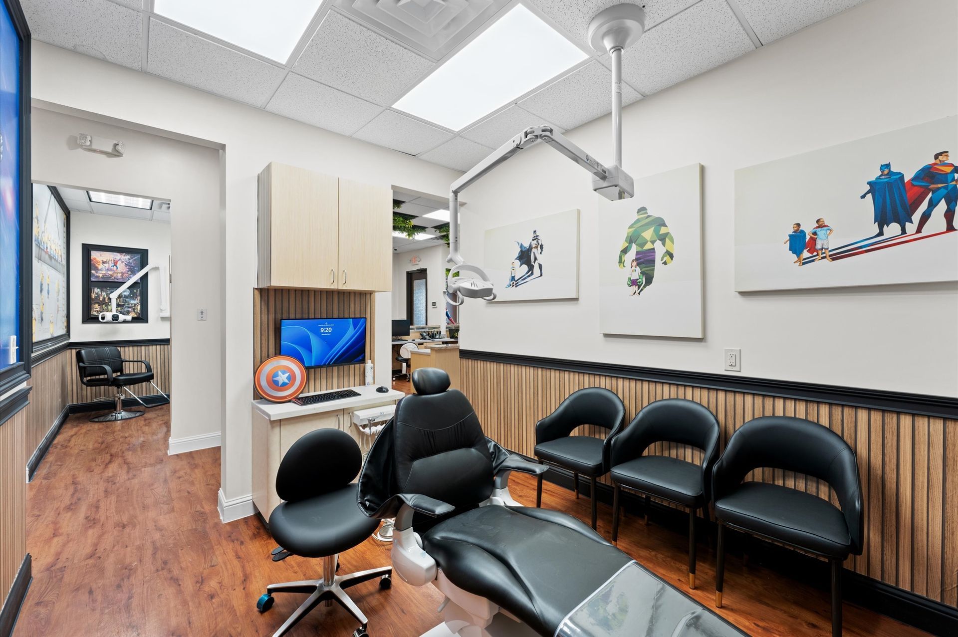 Adventure Smiles Dental & Orthodontics in Houston - A dental office with a waiting room and a dental chair.