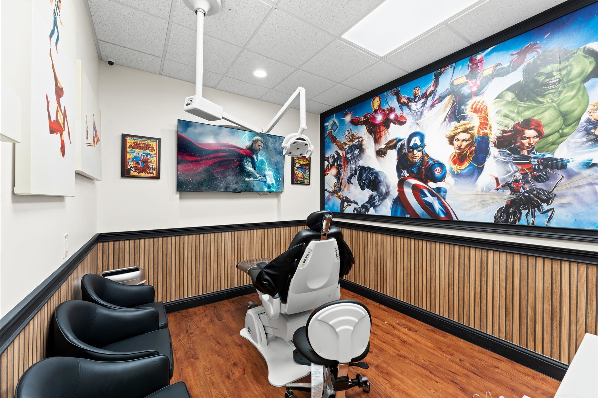 Adventure Smiles Dental & Orthodontics in Houston - chair in a dental office with a mural on the wall.