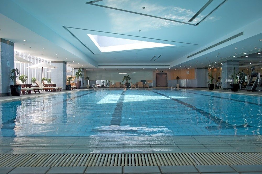 Indoor Swimming Pool in A Modern Building with Blue Water — Ultra Clear Pool Care in Cranbrook, QLD
