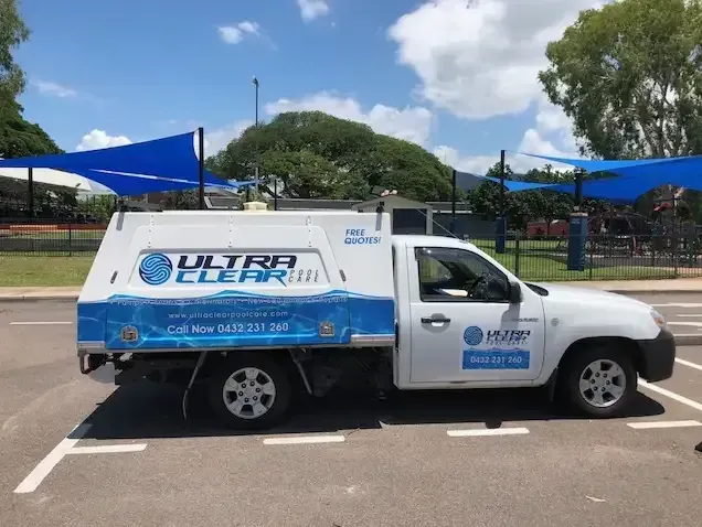 White Ultra Clear Truck with Blue Accents Parked in A Lot Under Blue Shade Sails — Ultra Clear Pool Care in Cranbrook, QLD