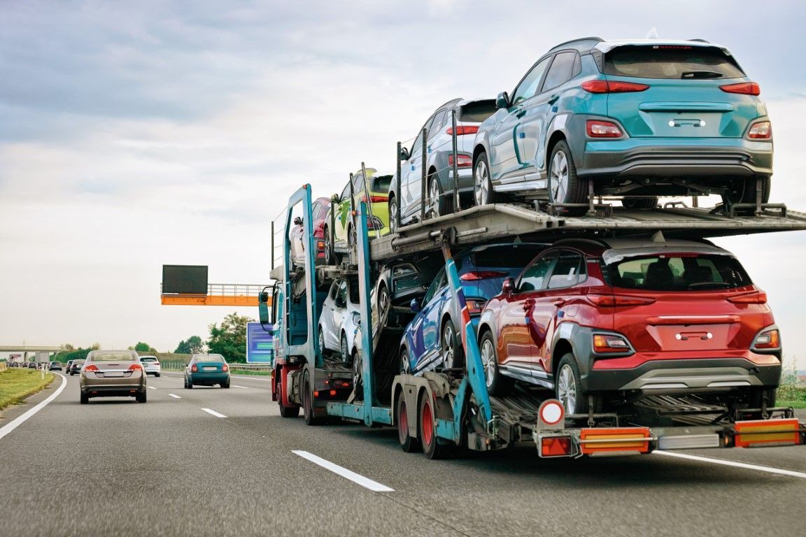 Semi truck transporting premium vehicles.