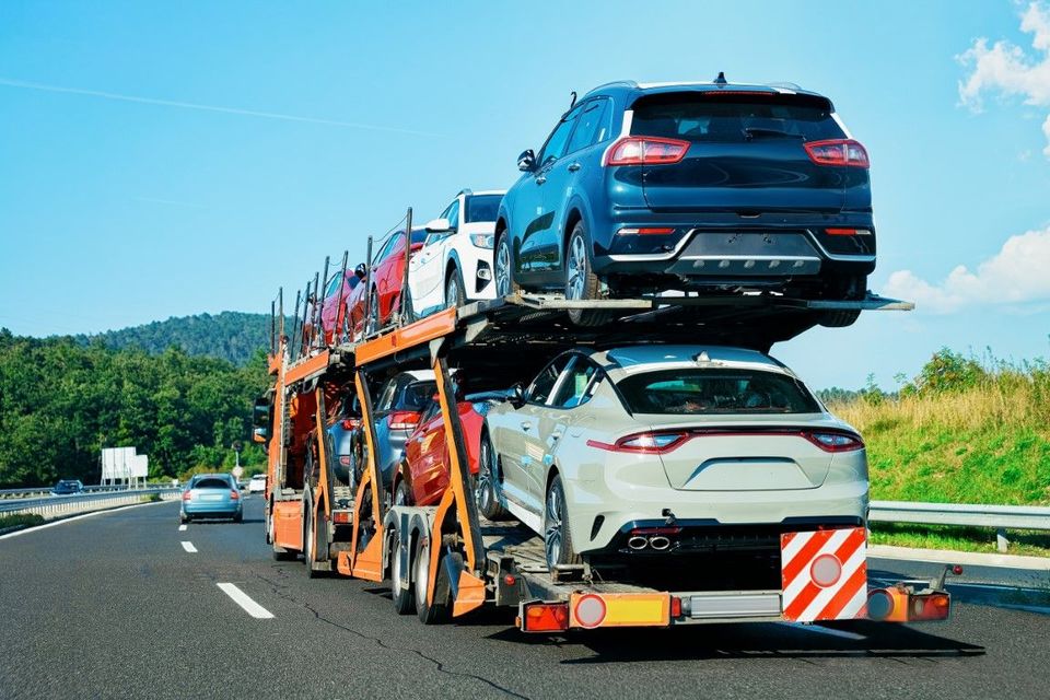 semi truck and open auto transporting vehicles.