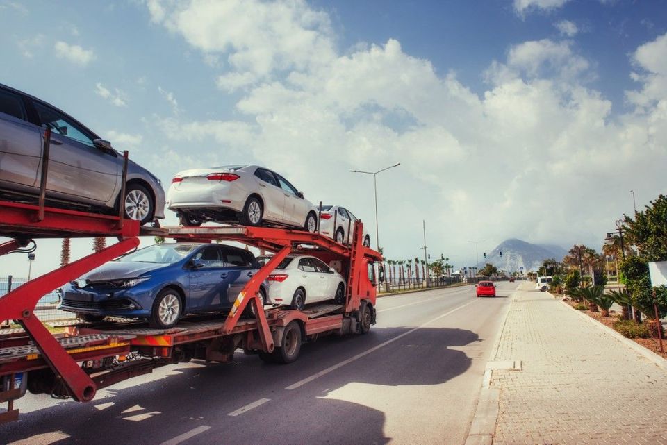 semi truck and open auto transporting vehicles.