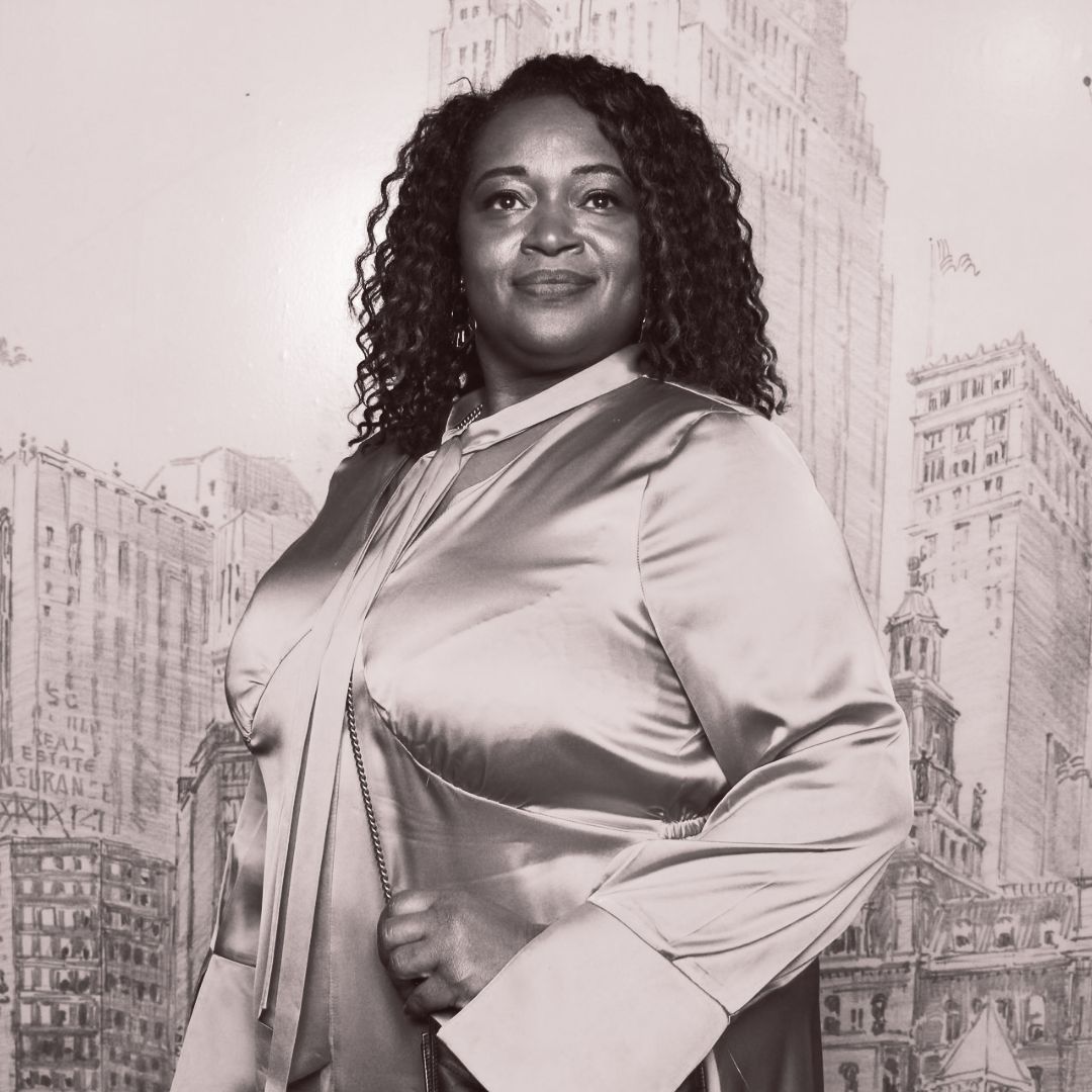 Woman strikes a posed at the Detroit Historic Society 100 Event with the Ever After Glam Photo Booth