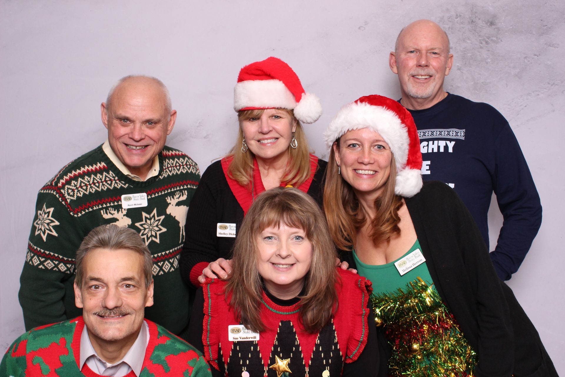 Woman strikes a posed at the Detroit Historic Society 100 Event with the Ever After Glam Photo Booth