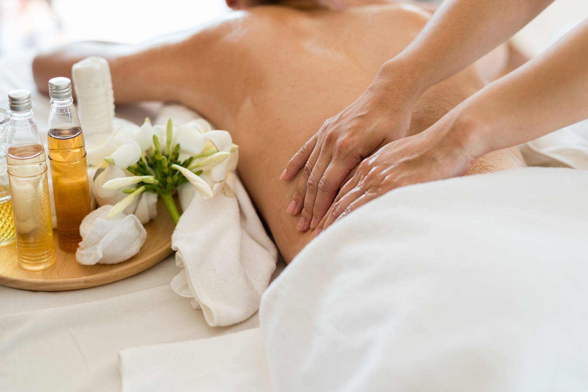A woman is getting a massage at a spa.