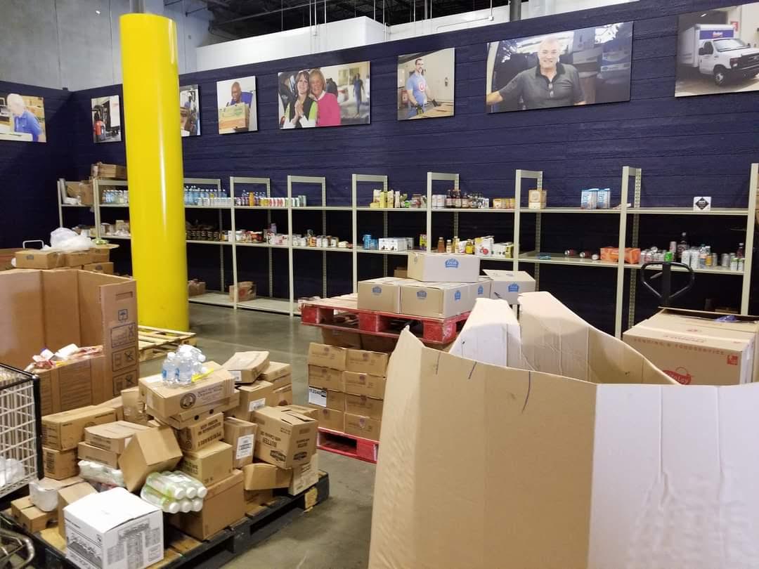 A warehouse filled with lots of boxes and shelves