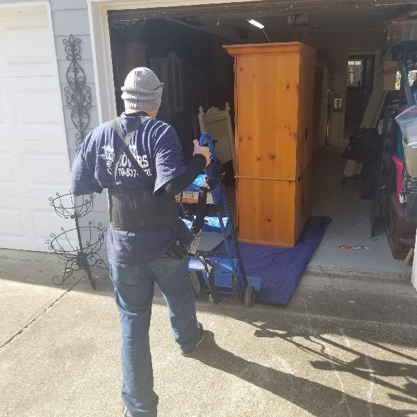 A man in a blue shirt with the word texas on it