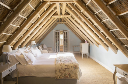 Sunny luxury attic bedroom