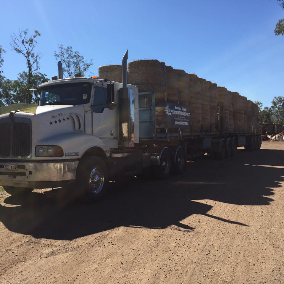 Hay Bails On Truck — Freight Services in Wallaville, QLD