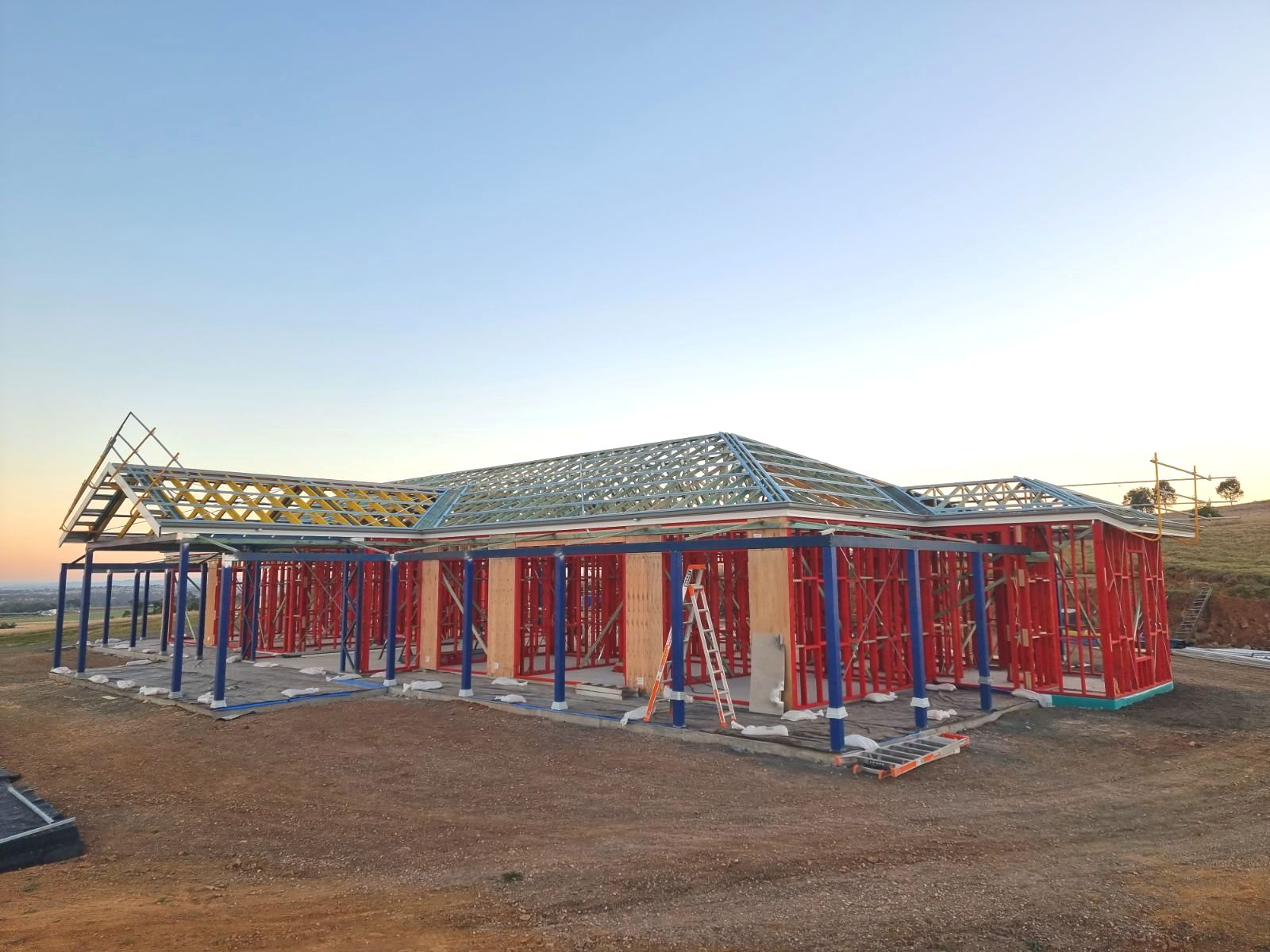 Outside of a Wooden House Frame Under Construction — Trussframe in Tamworth, NSW