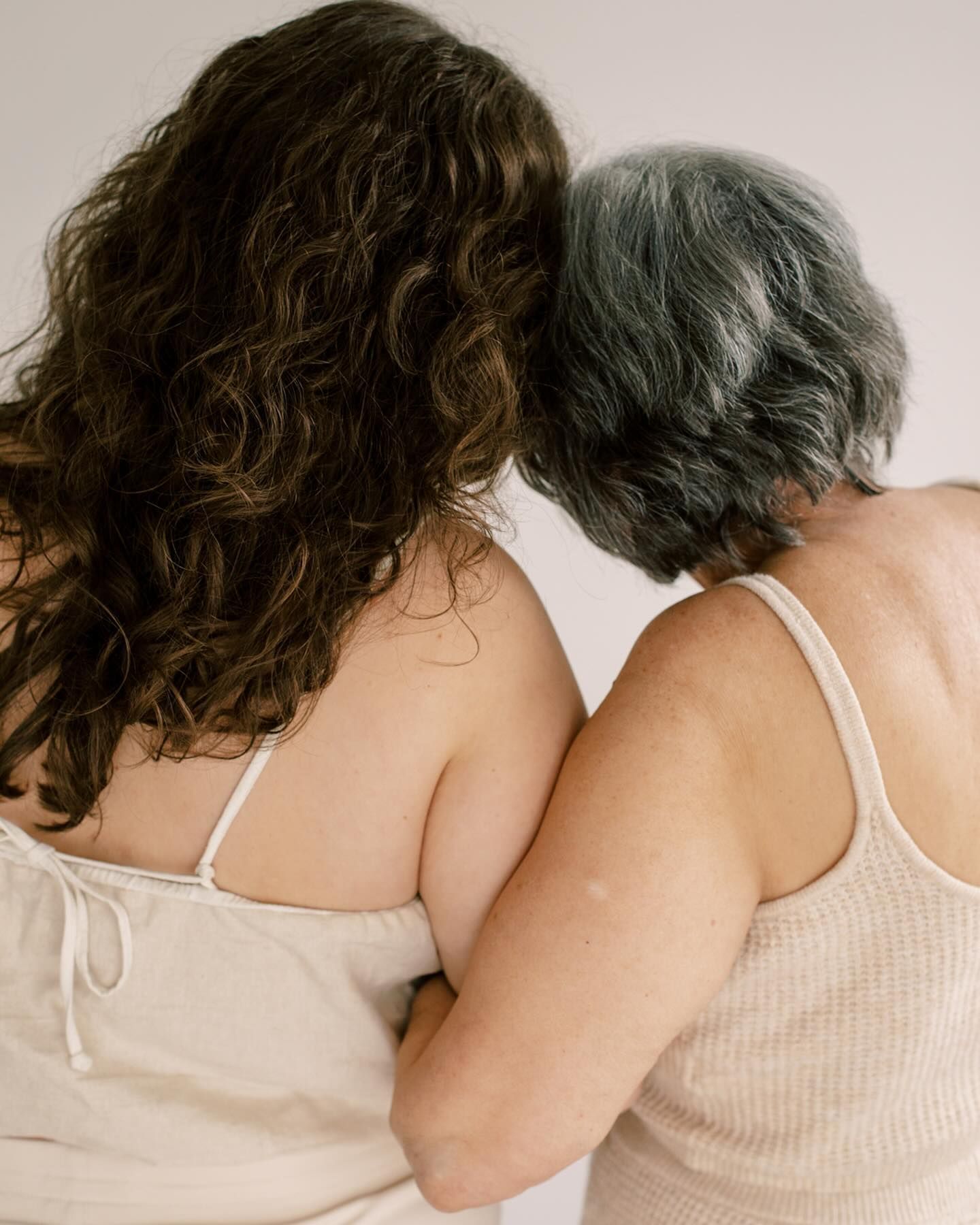 Two Women Embracing, Facing Away — Skin Haven Aesthetics Whitsundays in Airlie Beach, QLD