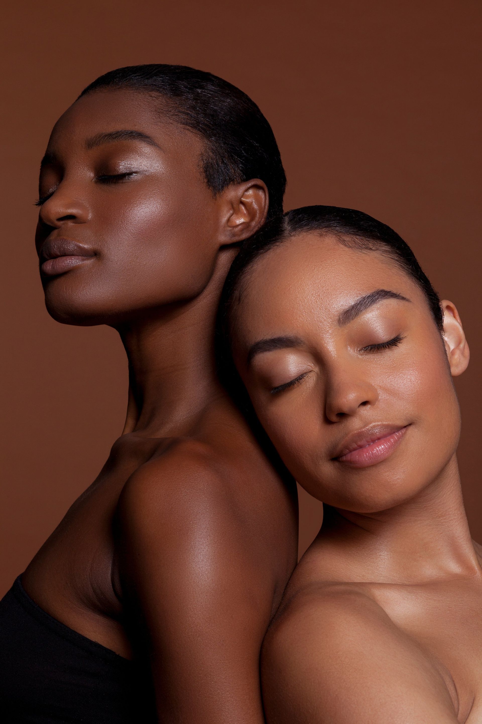 Two Women, With Radiant Skin, Eyes Closed — Skin Haven Aesthetics Whitsundays in Airlie Beach, QLD