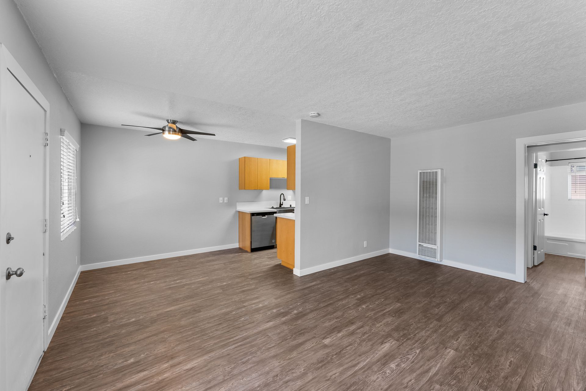 living room with peak of kitchen