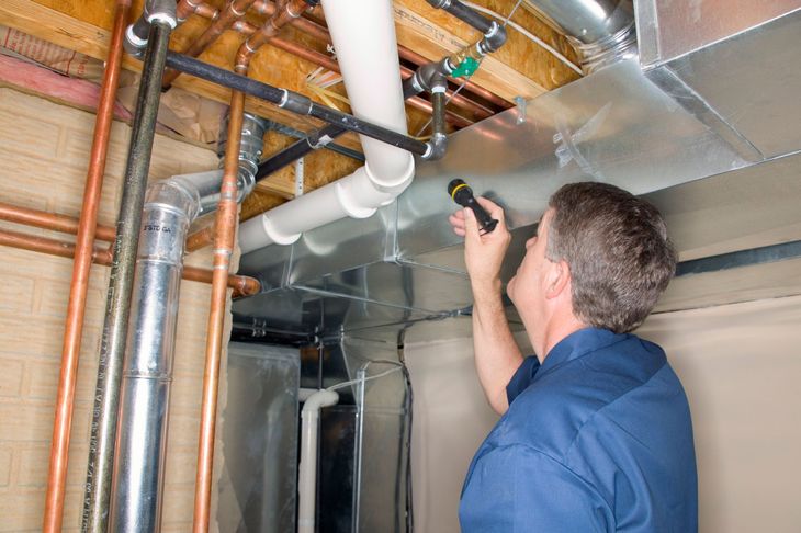 Male Inspecting Pipes — Weston, FL — 1A Florida Plumbing, Inc.