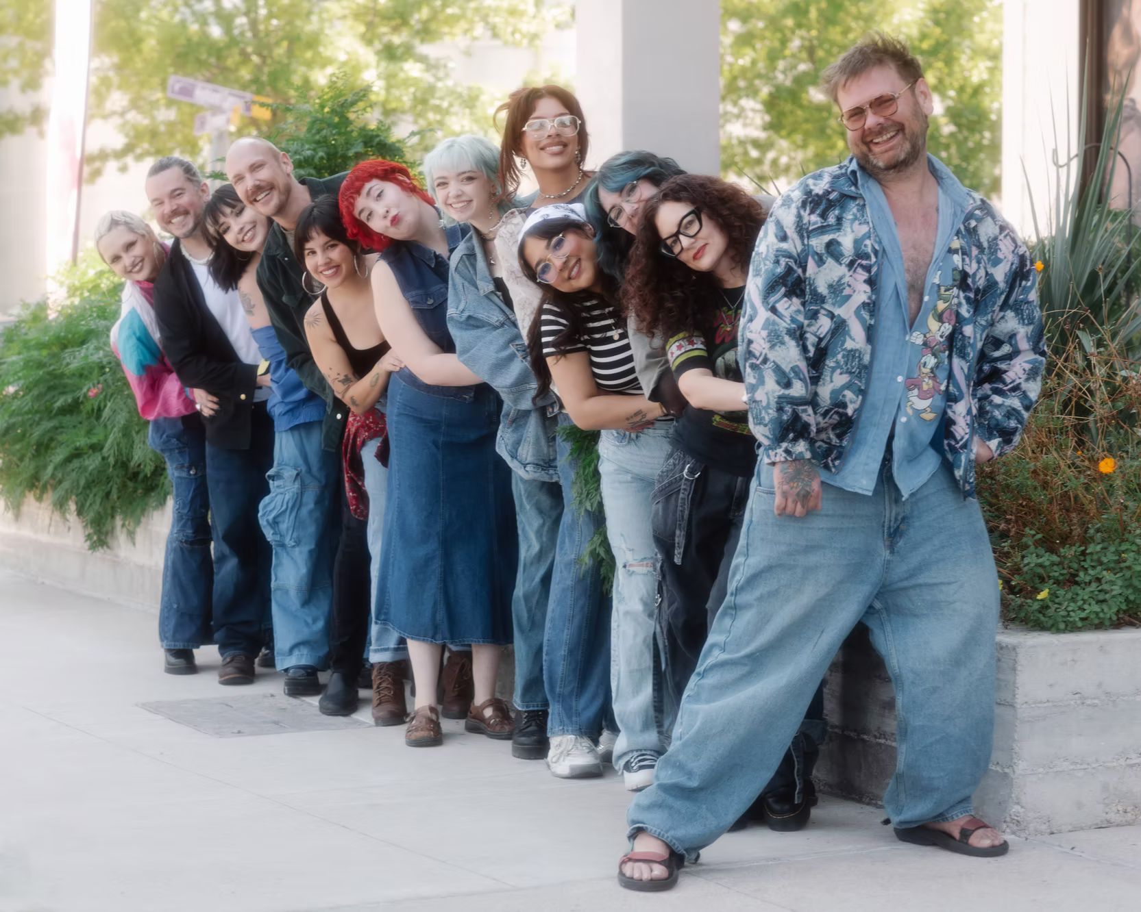 A group of people are posing for a picture together