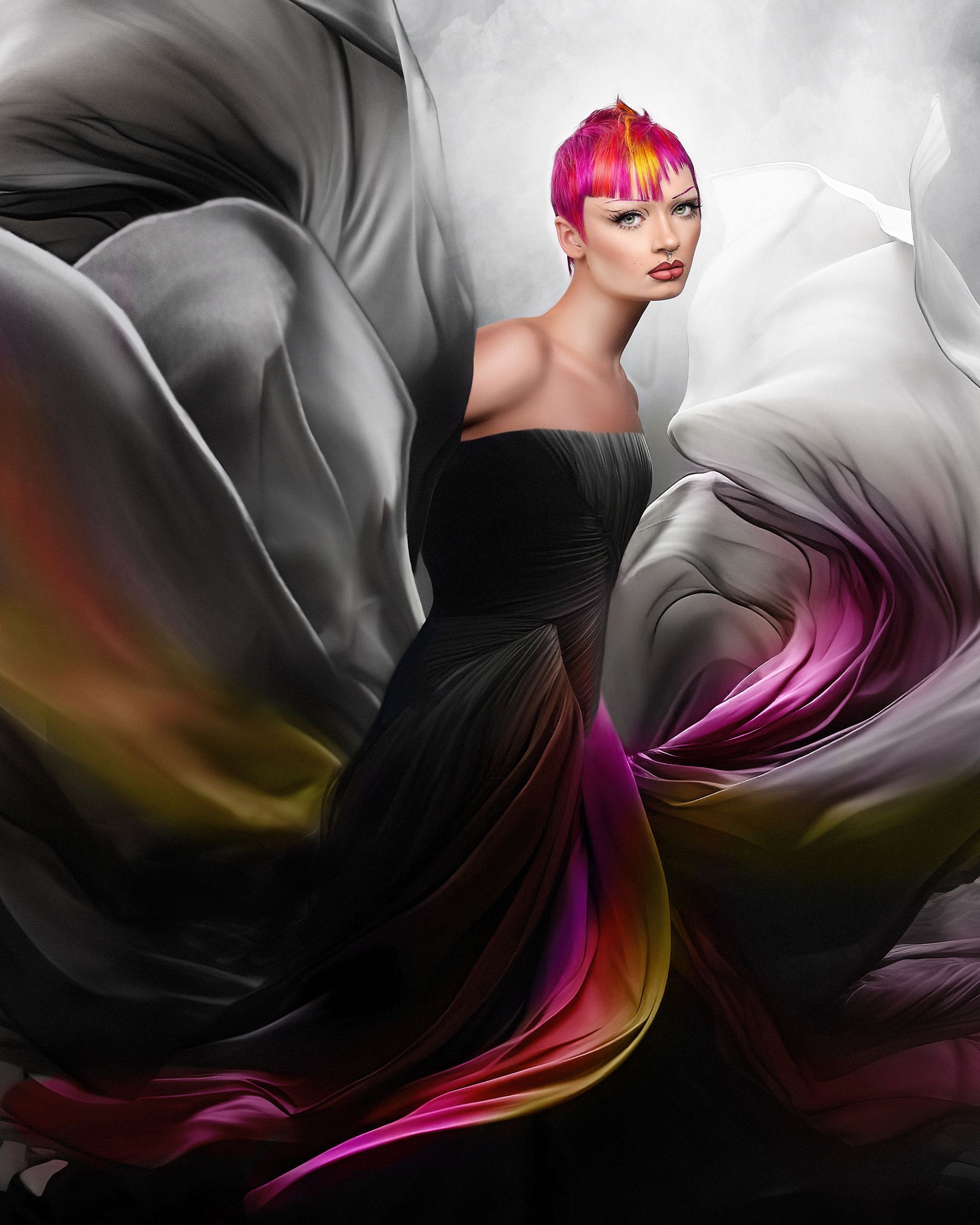 A woman with pink hair in a black dress