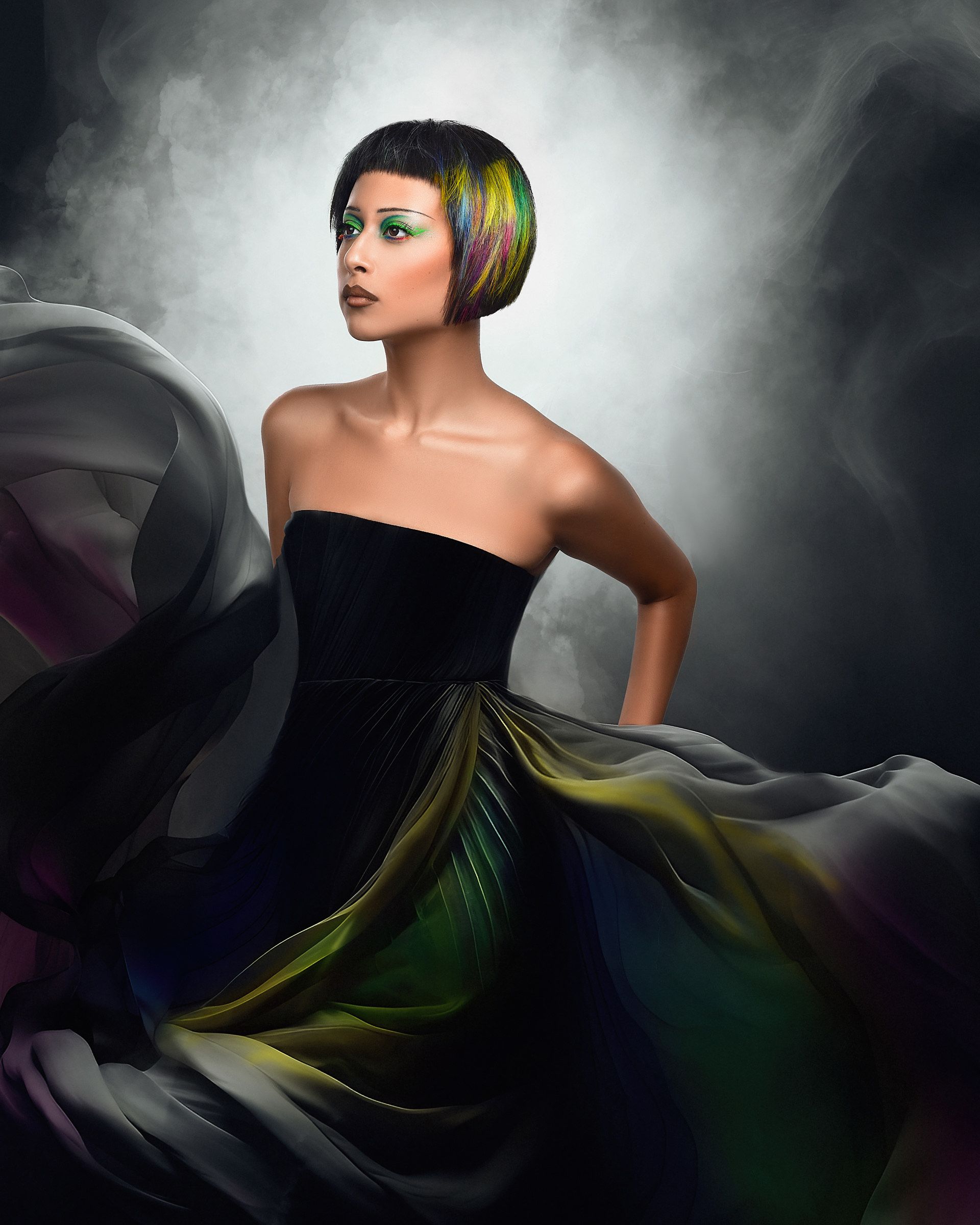 A woman in a black dress is standing in front of a cloudy sky