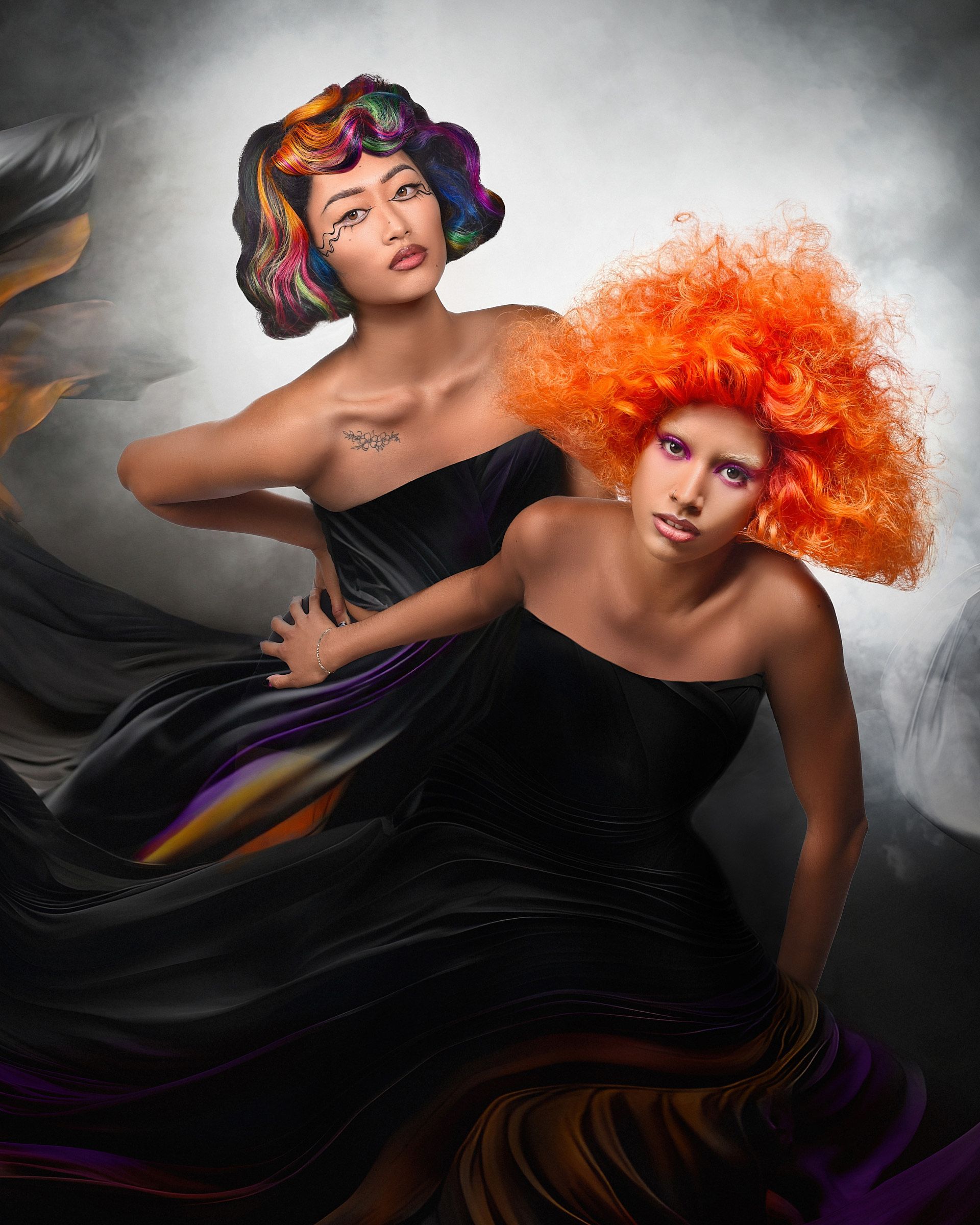 Two women with colorful hair are standing next to each other