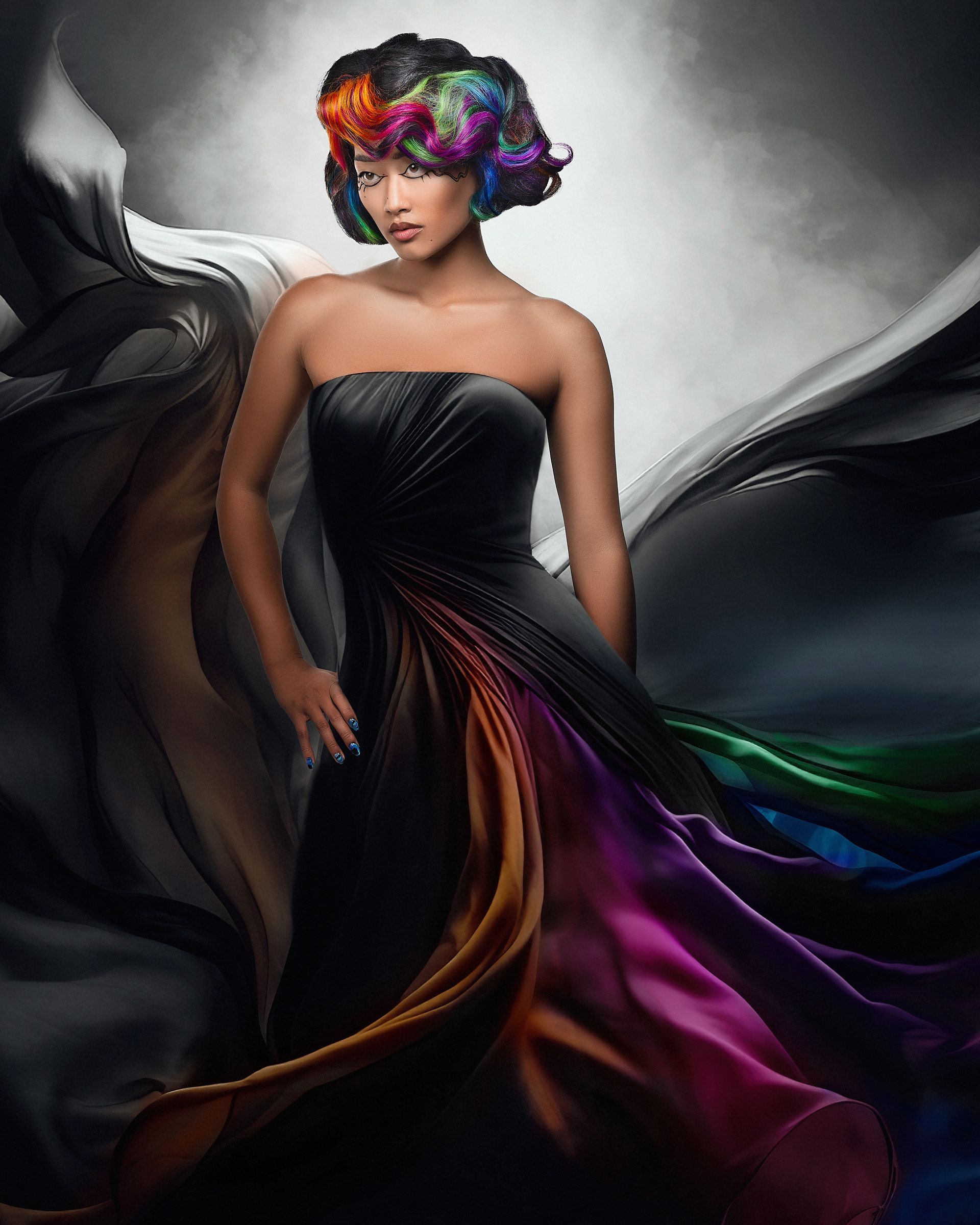 A woman in a black dress with a rainbow hairdo