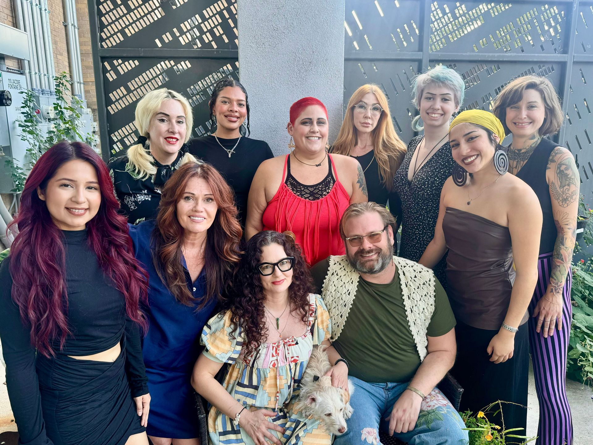 A group of people are posing for a picture together.