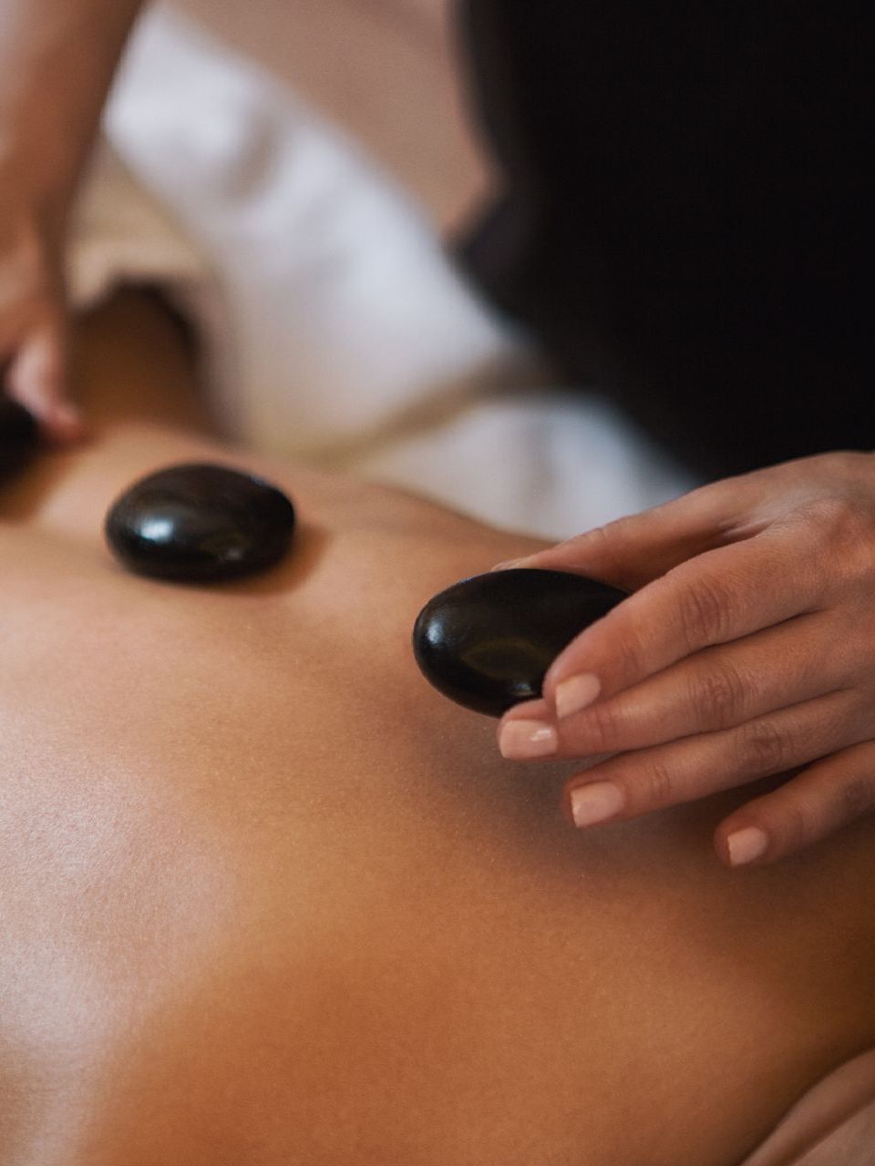 Hot stones on the back