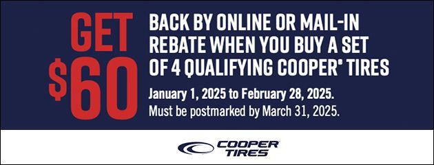 A sign that says get back by online or mail in rebate when you buy a set of 4 qualifying cooper tires