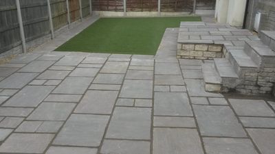 paved garden area with paved access steps