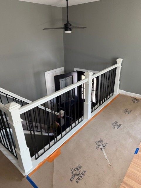 Custom Interior Railing Between Customers Existing Posts In Cedar Falls, IA