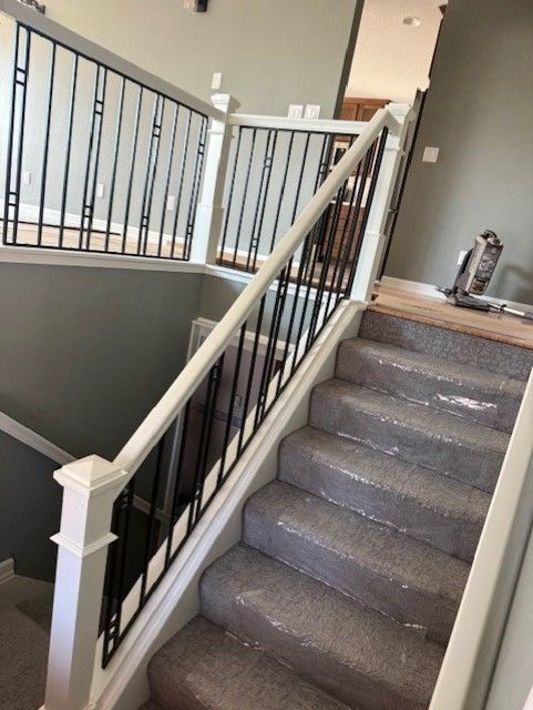 Custom Interior Railing Between Customers Existing Posts In Cedar Falls, IA