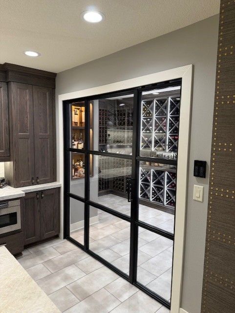 Custom Glass Wine Cellar Door In Waterloo, IA