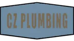 Blue shield-shaped sign with “CZ PLUMBING” in brown lettering