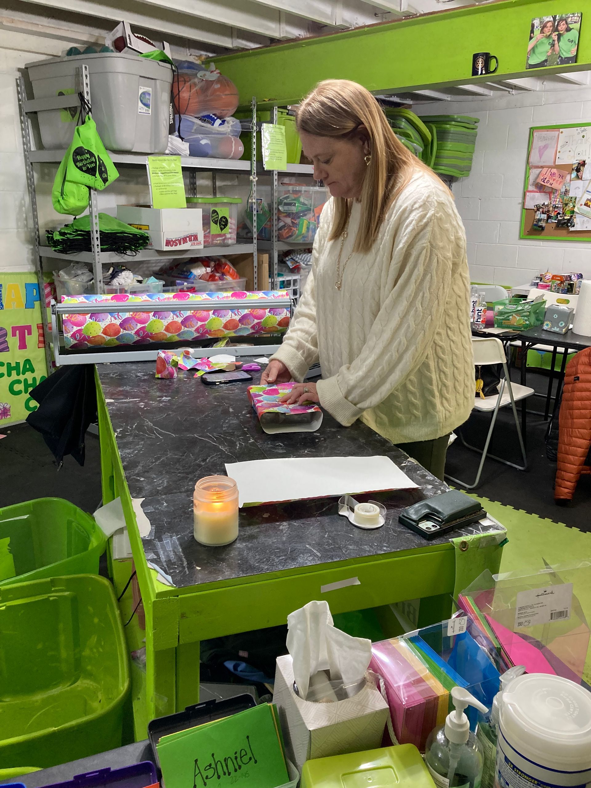 Kiwanians help pack bags for school students in high-poverty school districts around Rochester