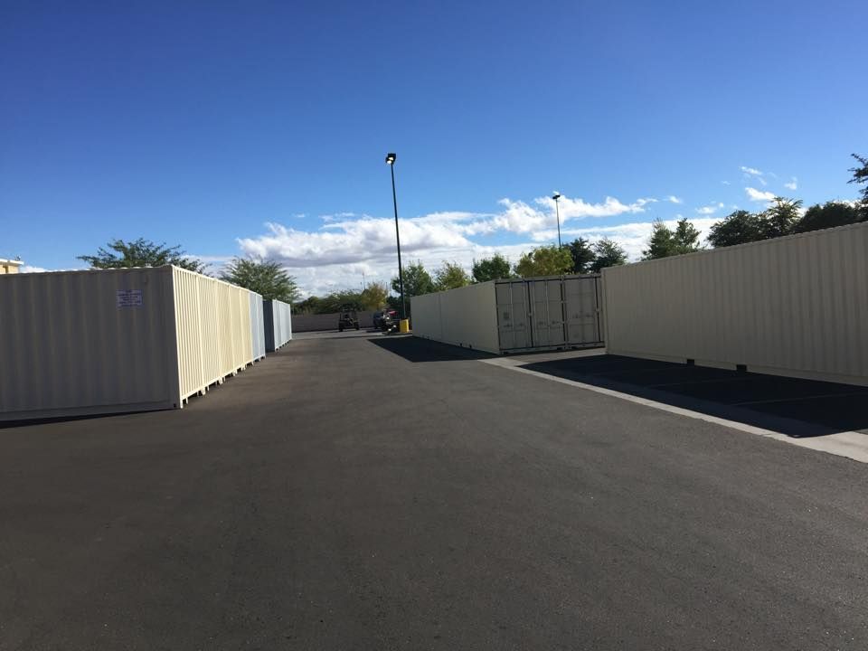 A road with a lot of fences along the side of it