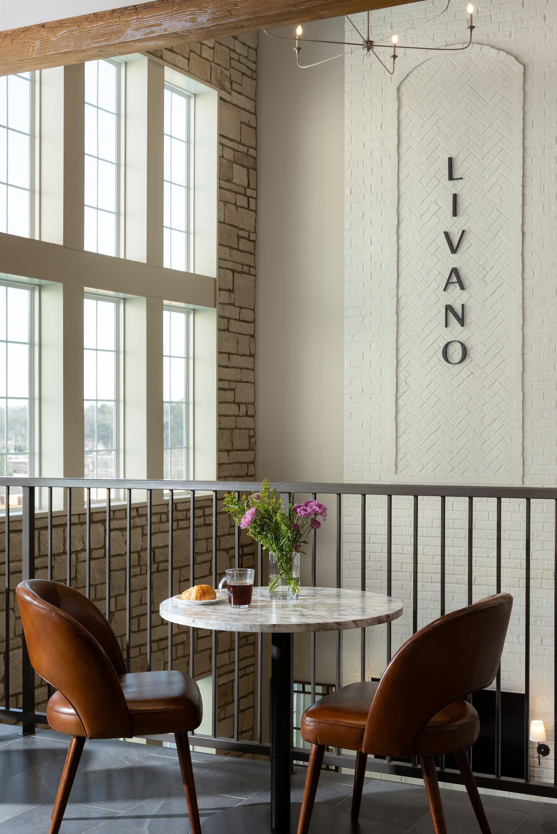 Resident lounge area with kitchen barstools.