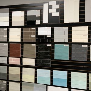 There are many different types of tiles on the wall.