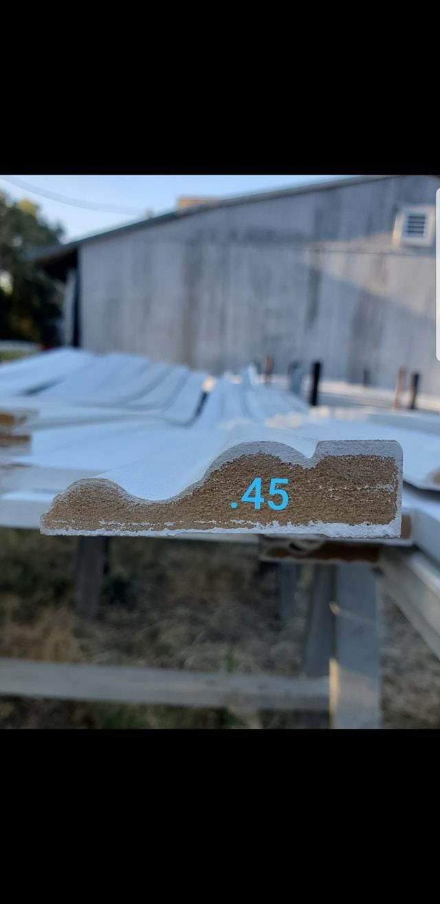 A close up of a piece of wood with the number 45 on it.