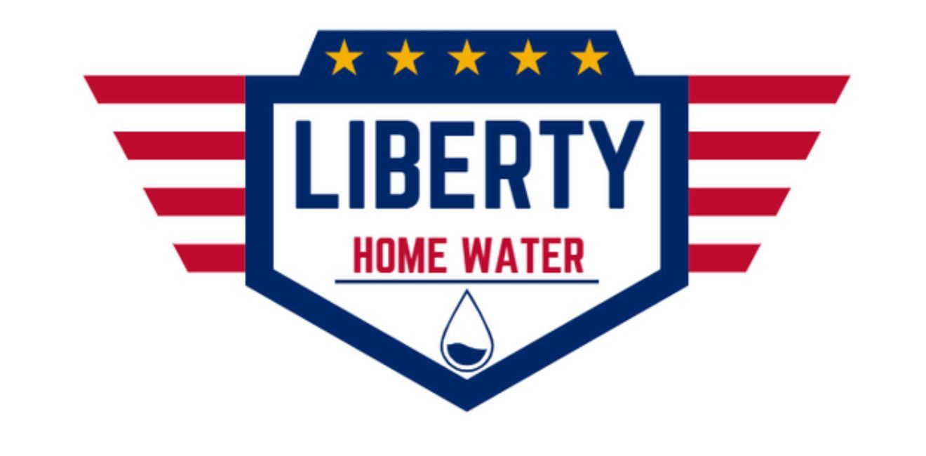 Logo of Liberty Home Water. A shield-shaped emblem in blue and white with a water drop icon. Red and white wings extend outwards.