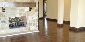 Chair and Couch on Wooden Floor  — Floor Installation in Northlenn, CO