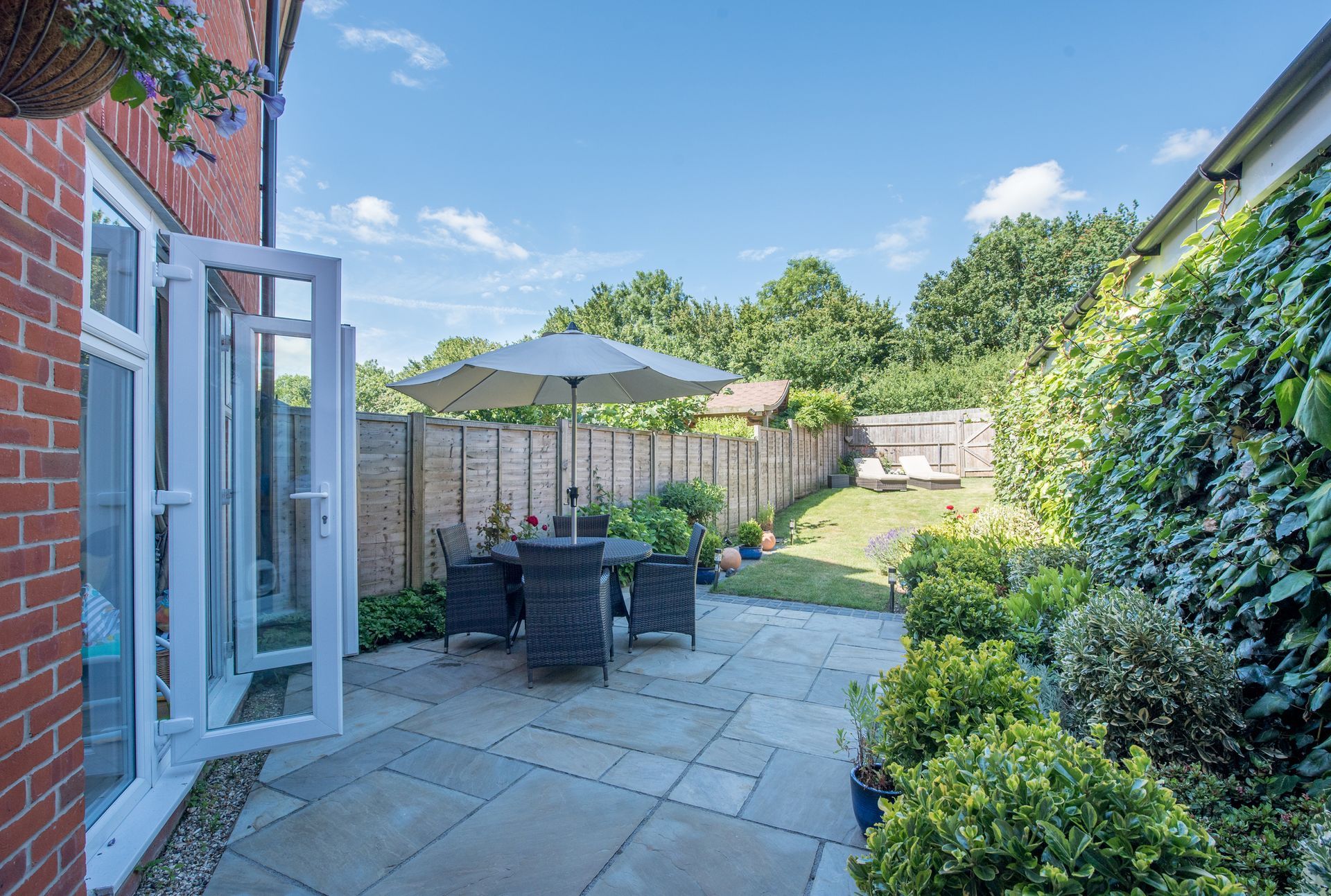 A Back Garden on a Sunny Hot Day with Clear Blue Sky of a Home | Gordon, Act | Capital Epoxy Flooring