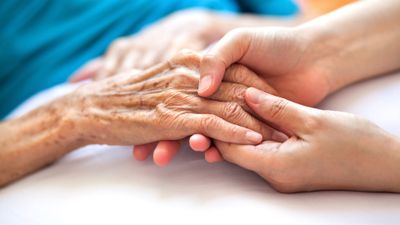 In-home Care — Supporting the Hand of an Elderly in Lincoln, NE