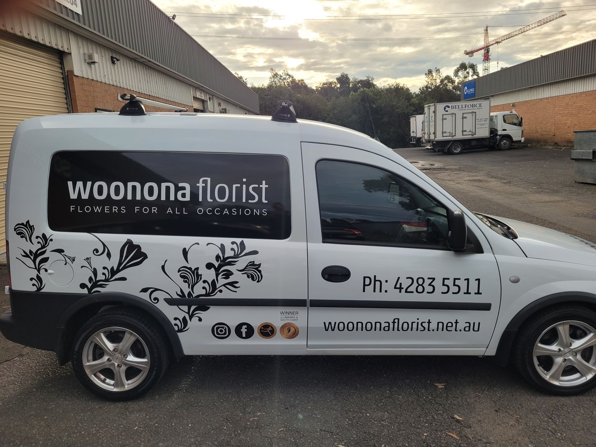 Man Screenprinting a T Shirt — Professional Signs in Wollongong