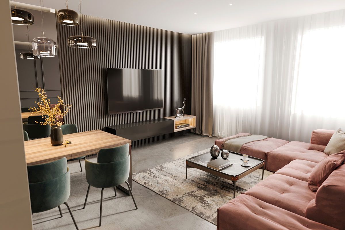 A living room with a couch , table , chairs and television.